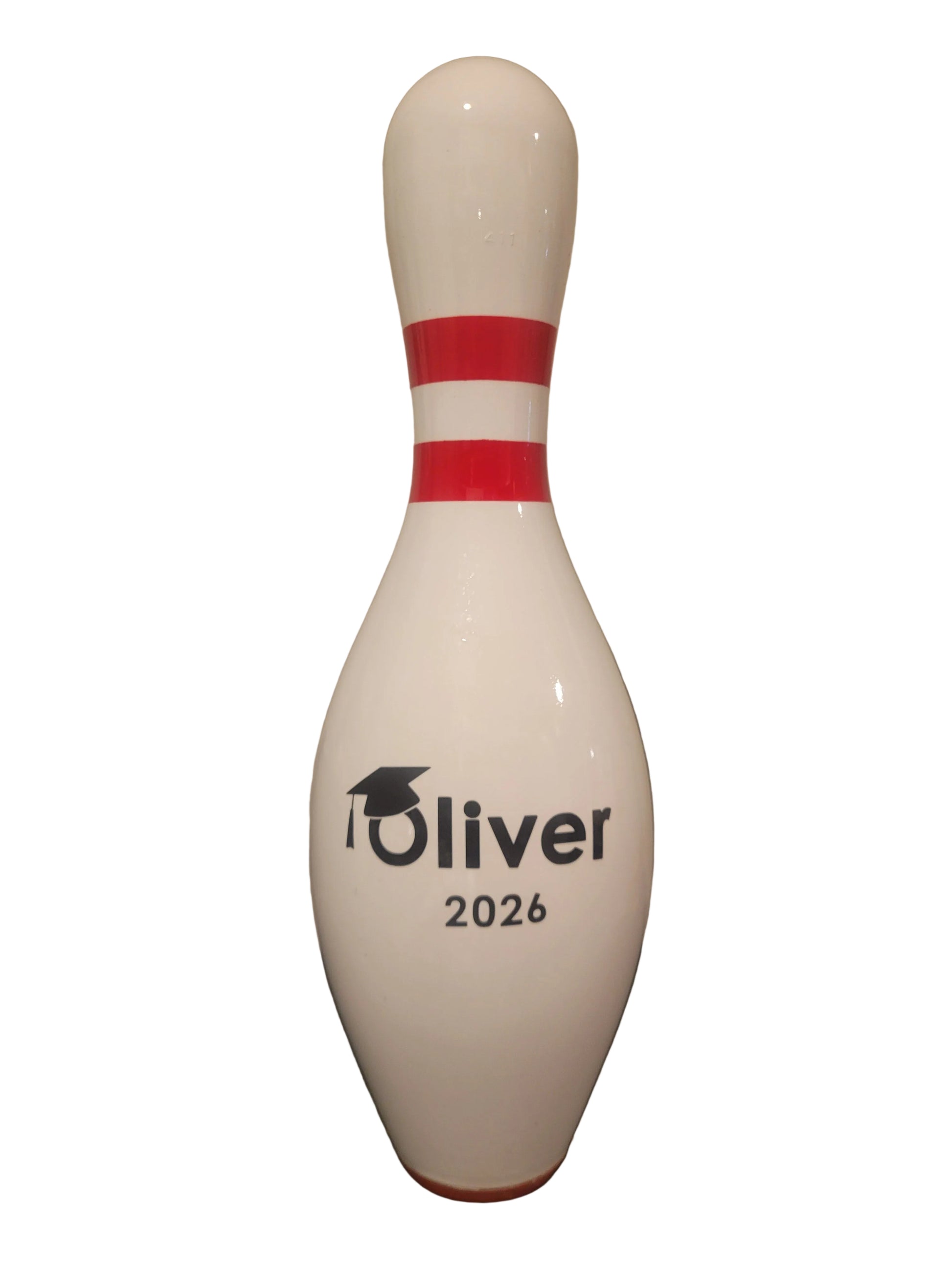 A custom white bowling personalized with a graduation cap.