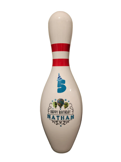 A white bowling pin with a custom blue '5th Birthday' graphic.