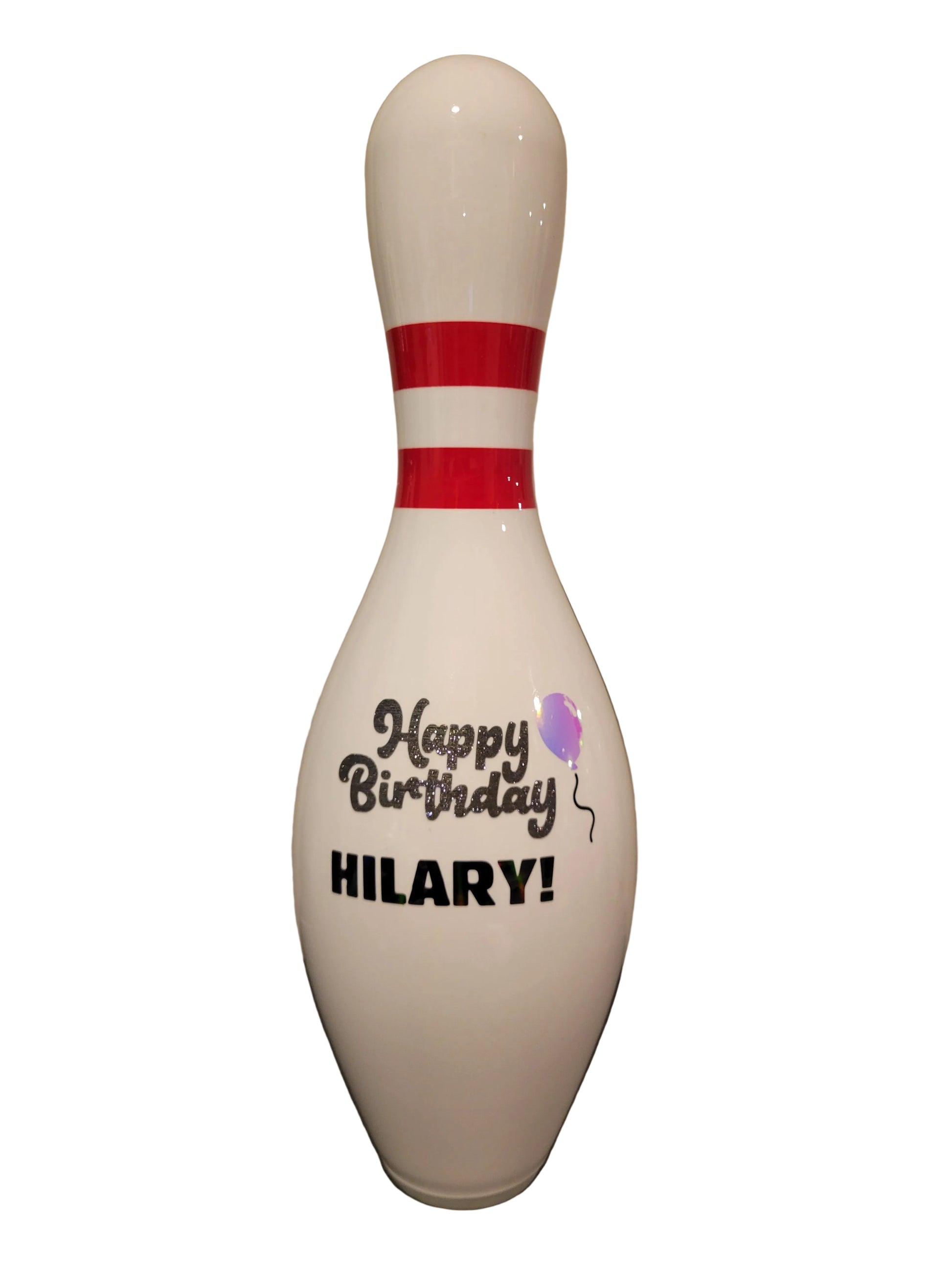 A custom white bowling pin with a 'Happy Birthday' design on the front.