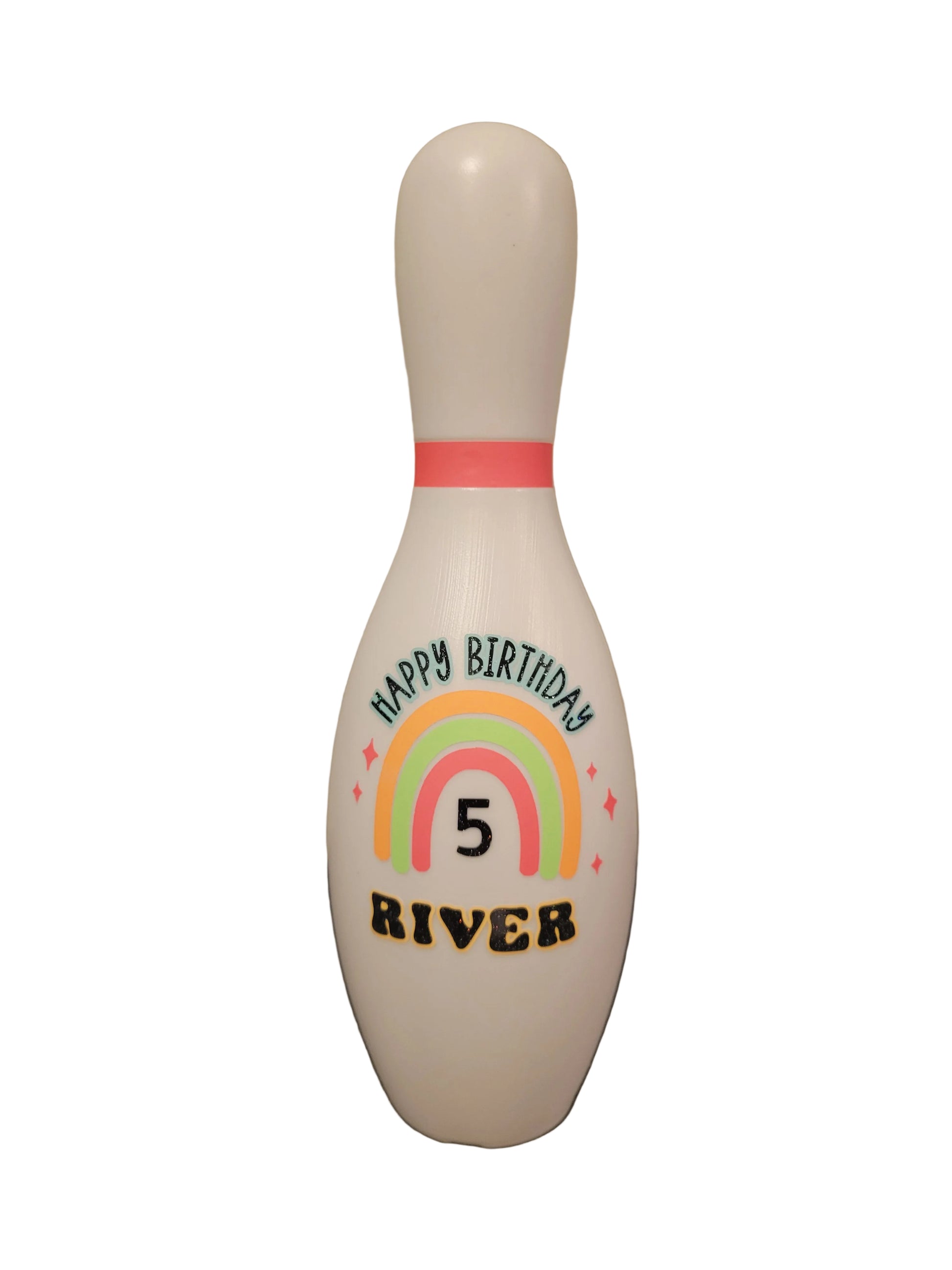 A custom birthday bowling pin with a rainbow theme